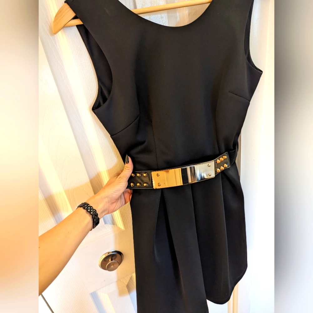 Open back, belted black dress